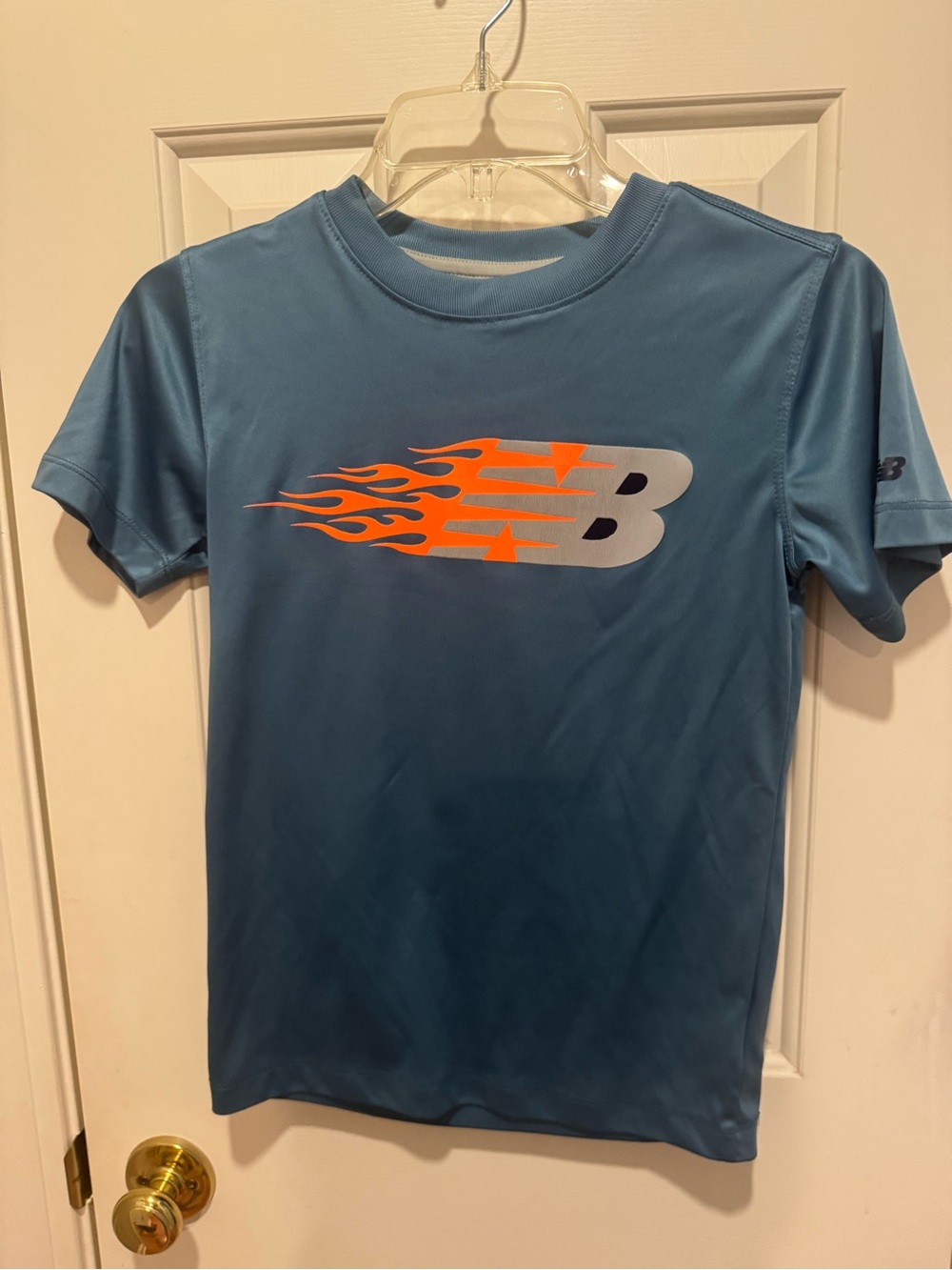 New Balance Teal Short-Sleeve Logo Tee with Orange Flame